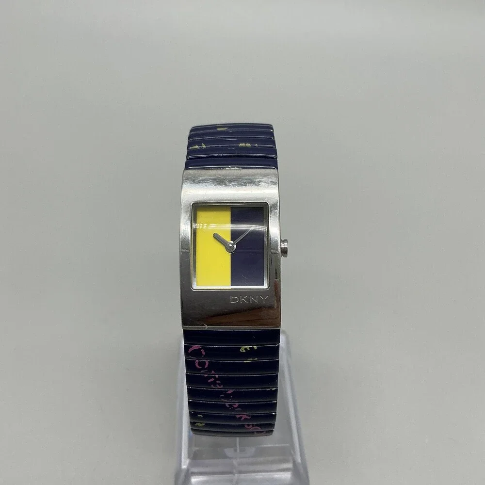DKNY Womens Watch 19mm Silver Tone Multicolor Dial Blue Stretch Band New Battery